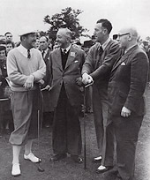 Four golfers chatting